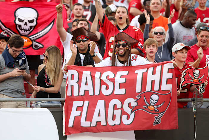 Jan 1, 2023; Tampa, Florida, USA; fans celebrate after the Tampa Bay Buccaneers beat the Carolina Panthers at Raymond James Stadium. Mandatory Credit: Nathan Ray Seebeck-USA TODAY Sports